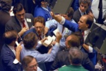 **FILE** Traders on the floor of the New York Stock Exchange work frantically as panic selling swept Wall Street in this Oct. 19, 1987 file photo. In the 20 years since one of Wall Street's worst crashes, the markets have grown bigger, more complex and faster. Investors have become increasingly aggressive, whether buying or selling. So while Wall Street was devastated by a 508-point plunge in the Dow Jones industrials on Oct. 19, 1987, a drop of that size today, while much smaller on a percentage basis, remains frightening. (AP Photo/Peter Morgan, File)